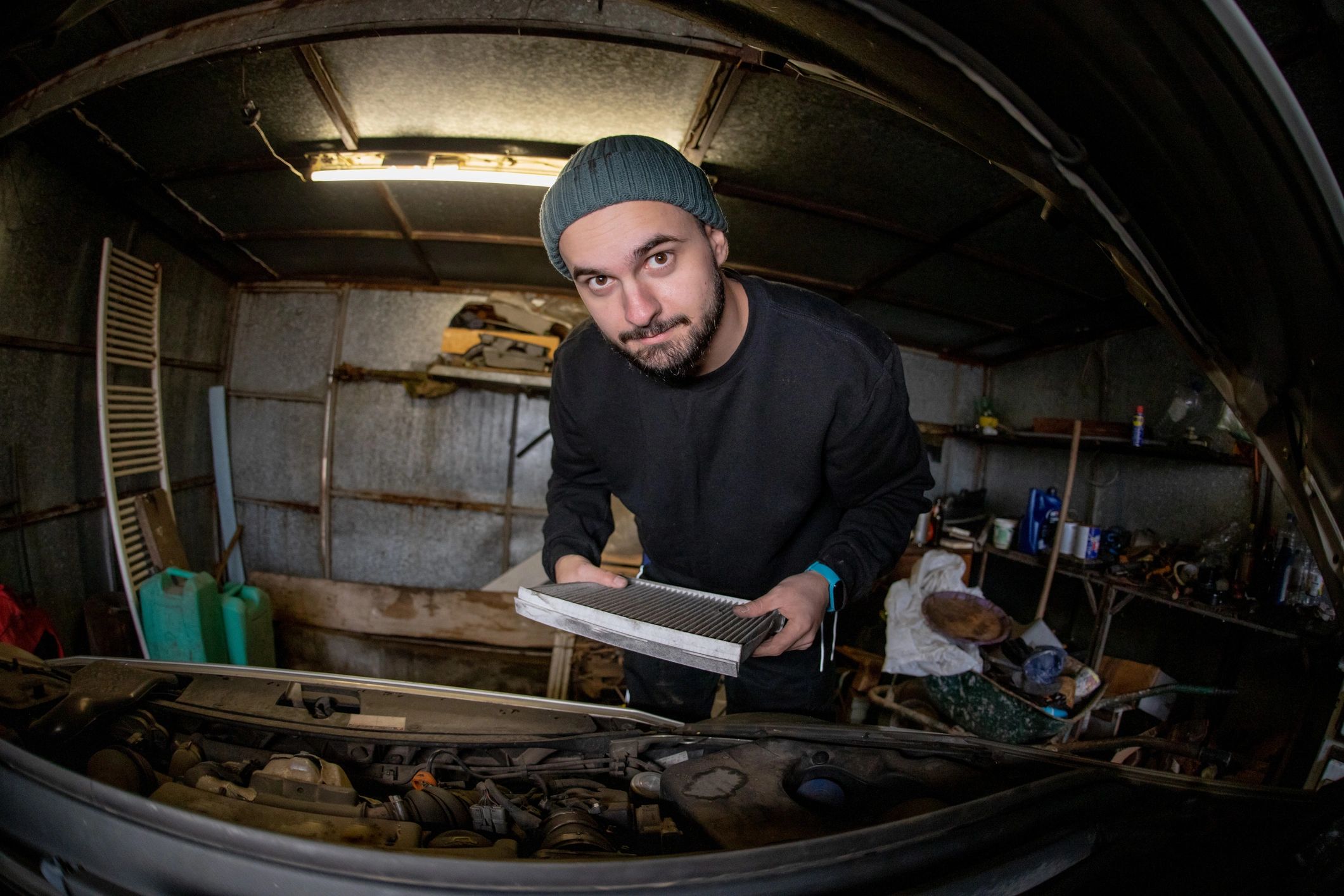 Technician working on cooling equipment